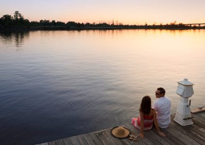 river at sunset couple